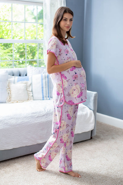 Anais pajamas with a feminine pink trim. Elastic waist, dolphin hem, cream and pink flowers, and snap closure for breastfeeding access.