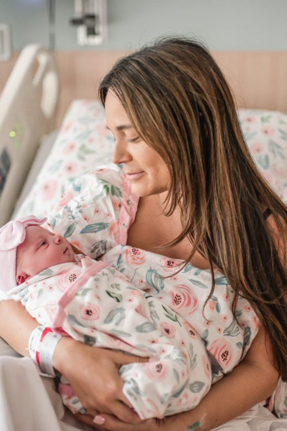 newborn baby girl in hospital just born